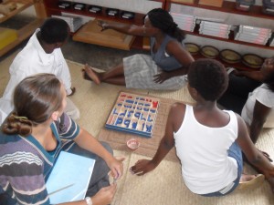 Jane Kabambe explaining object boxes, picture boxes and moveable alphabet as part of Montessori Language series!